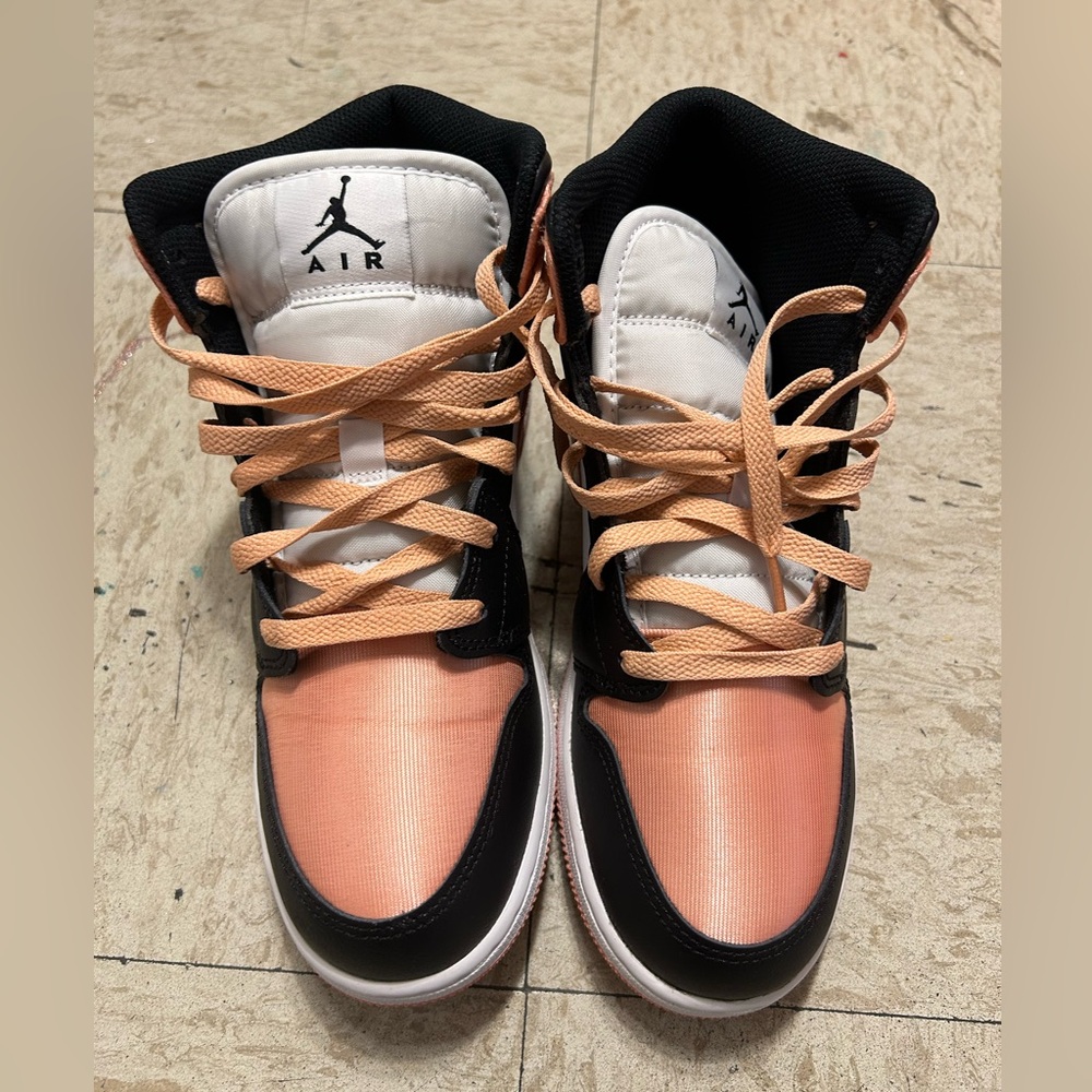 Black, white and peach high top shoes